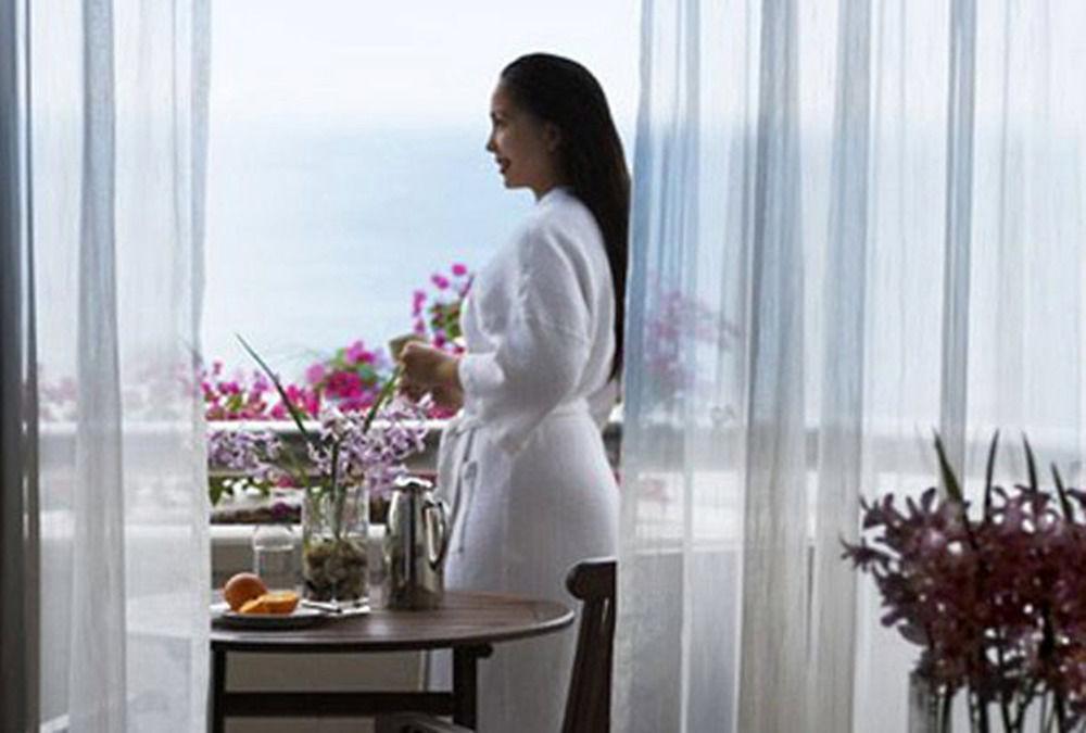 Miri Marriott Resort & Spa Room photo A woman wearing a bathrobe